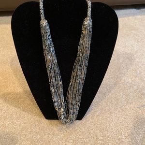 VINTAGE BEADED MULTI STRAND NECKLACE. BLUE GRAY.